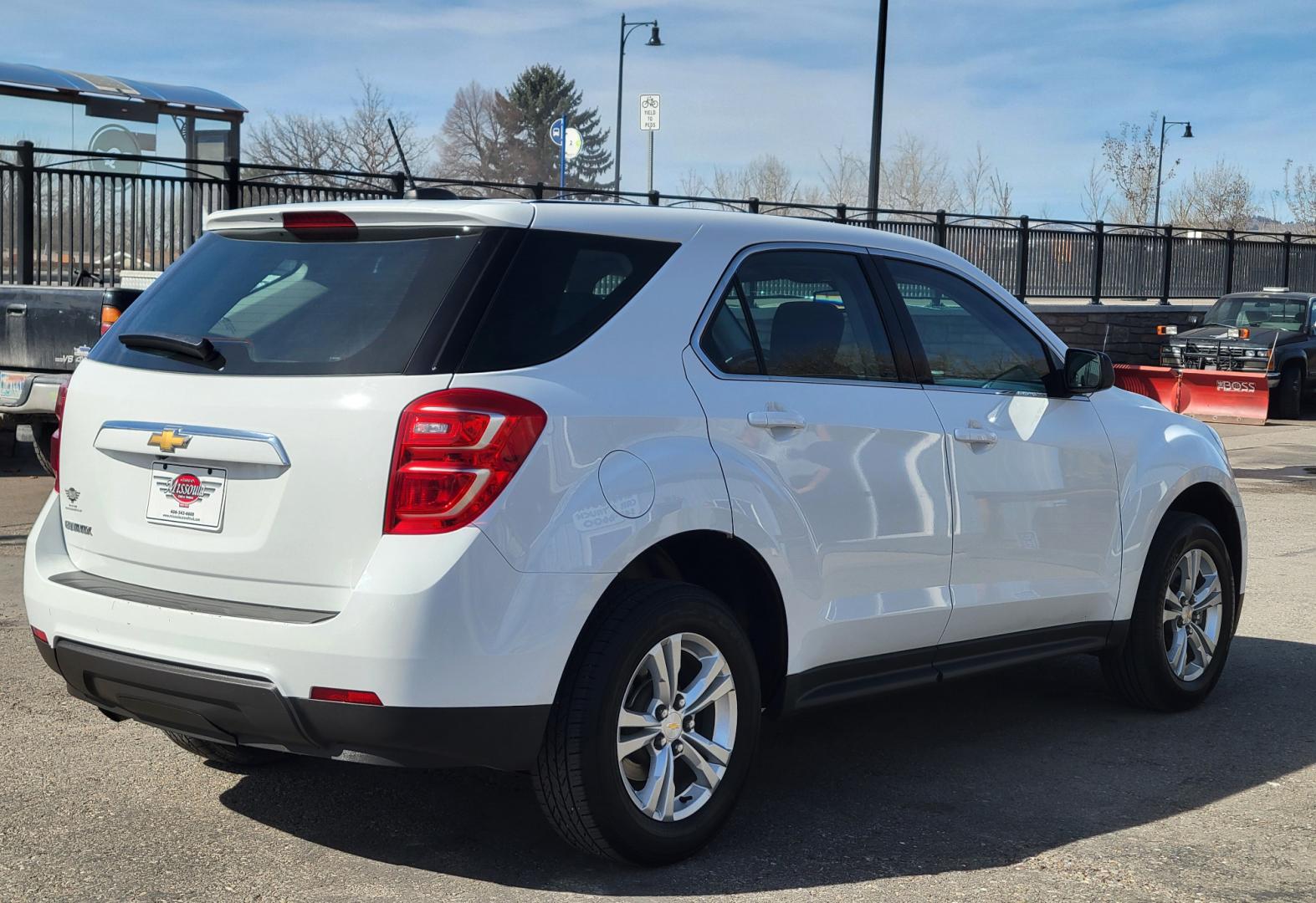 2017 White /Black Chevrolet Equinox LS 2WD (2GNALAEK3H1) with an 2.4L L4 DOHC 16V FFV engine, 6A transmission, located at 450 N Russell, Missoula, MT, 59801, (406) 543-6600, 46.874496, -114.017433 - Nice Front Wheel Drive SUV. 2.4L I4 Engine. 6 Speed Automatic Transmission. Bluetooth. Backup Camera. Air. Cruise. Tilt. Power Windows and Locks. - Photo#3